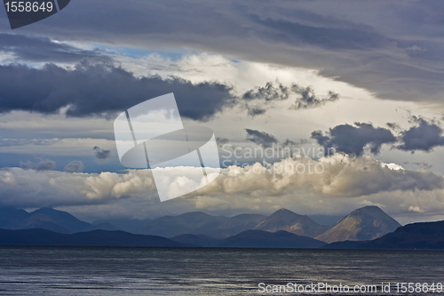 Image of cloudy sky over scottish mountains