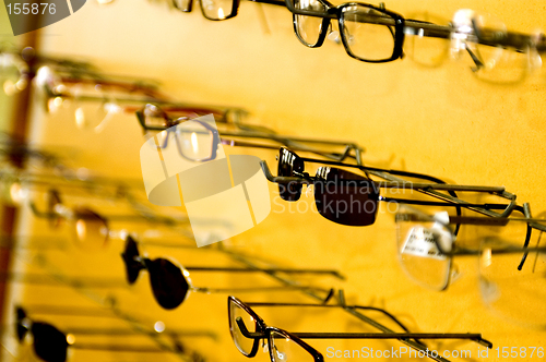 Image of eyeglasse frames on wall display