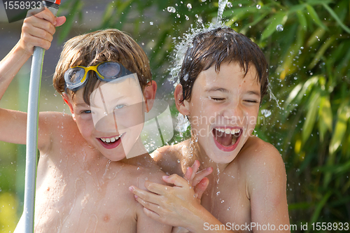 Image of children playing in the water