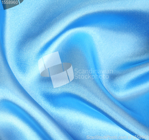 Image of Smooth elegant blue silk as background