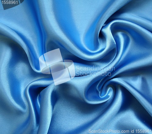 Image of Smooth elegant blue silk as background