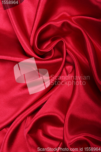 Image of Smooth elegant red silk as background 