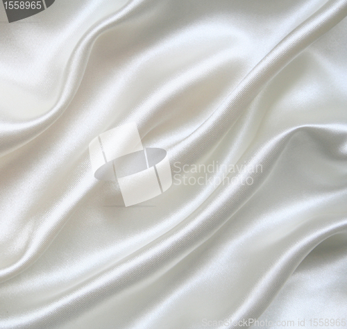 Image of Smooth elegant white silk as background 