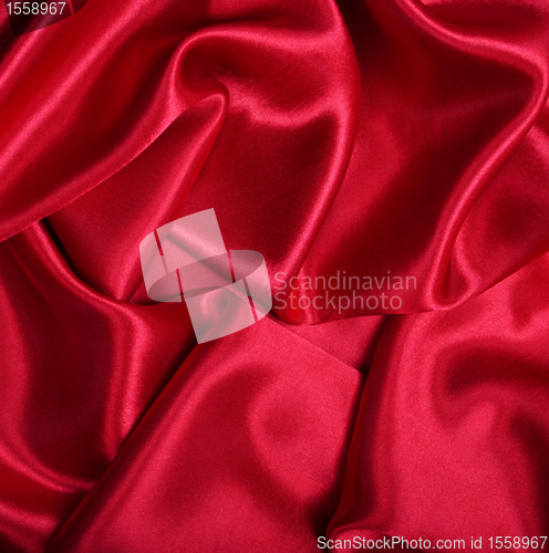 Image of Smooth elegant red silk as background 