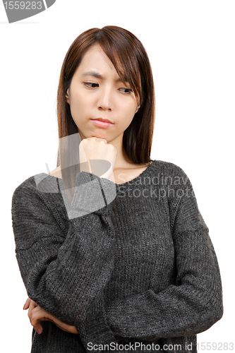 Image of Thinking woman looking up