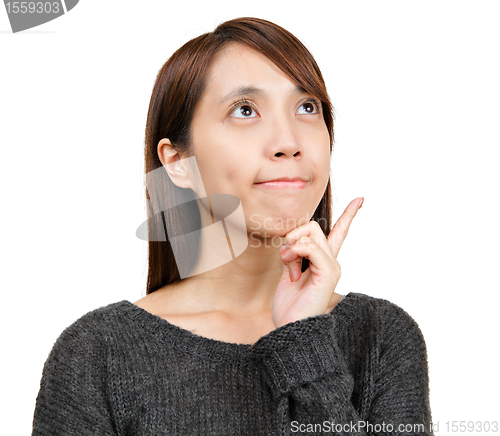 Image of Thinking woman looking up