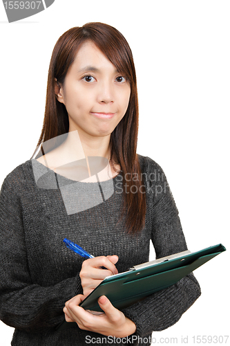 Image of woman write report