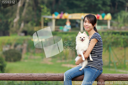 Image of girl with dog