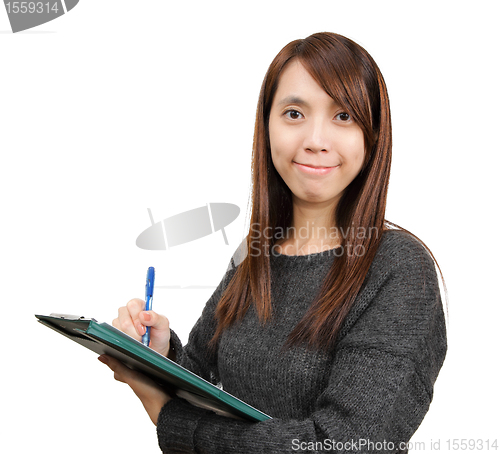 Image of woman write report