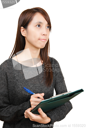 Image of woman write report