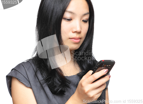Image of girl reads sms on phone