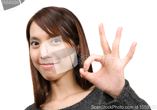 Image of woman show ok sign