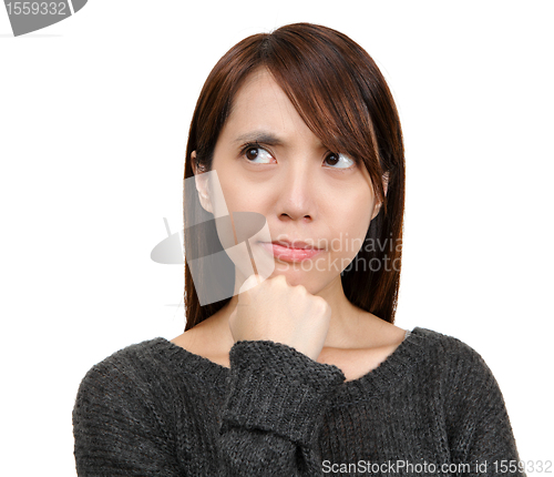 Image of young asian girl thinking