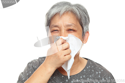 Image of sneezing woman