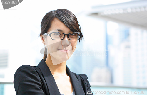Image of Portrait of happy young business woman
