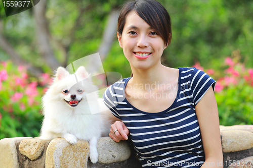 Image of girl with dog