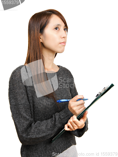 Image of woman write report