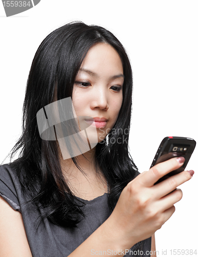 Image of woman sms text message on phone