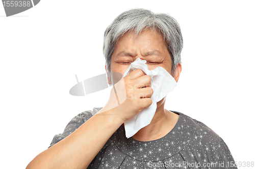 Image of sneezing mature woman