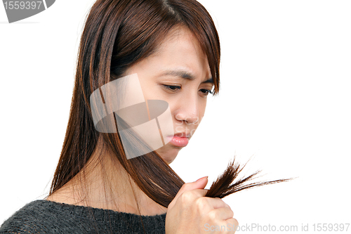 Image of woman have hair problem