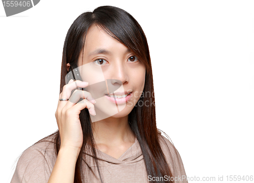 Image of young asian girl in phone call