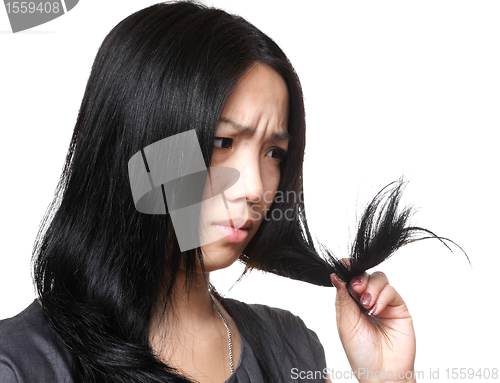 Image of woman have hair problem