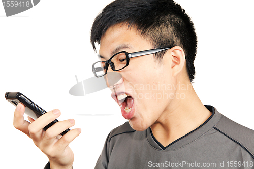 Image of man yells to his phone 