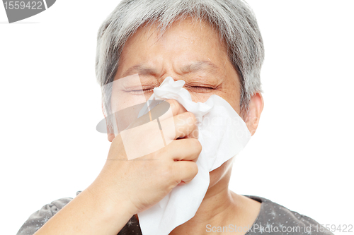 Image of sneezing woman