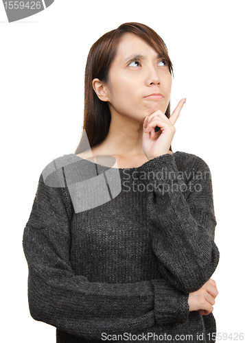 Image of thoughtful woman looking up