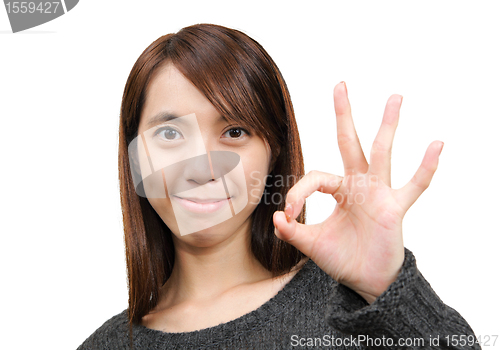 Image of woman show ok sign