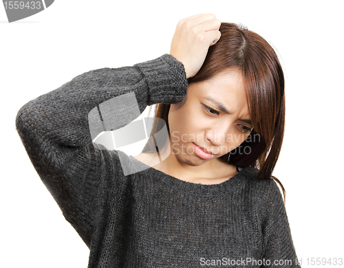 Image of woman with head ache