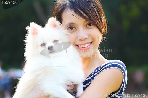 Image of Young girl with dog