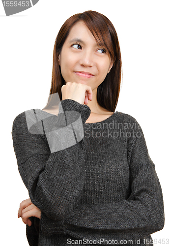 Image of thoughtful woman looking up