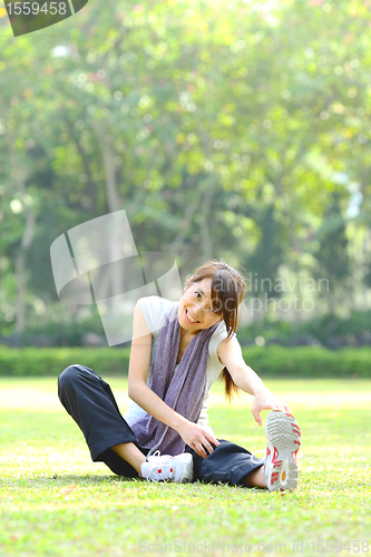 Image of woman doing stretching exercise