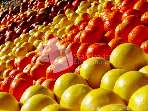Image of Tasty fruits oranges and apples
