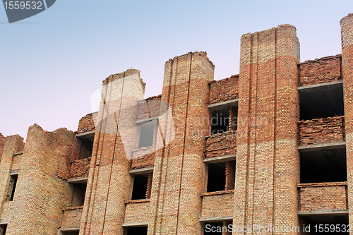 Image of Collapsing unfinished brick building