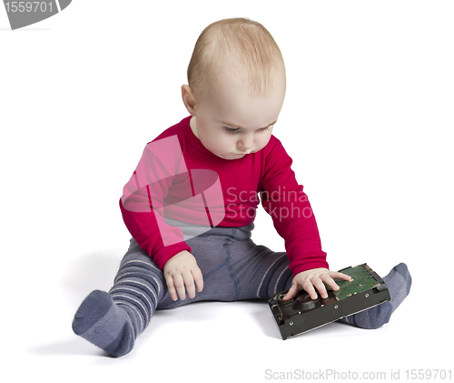 Image of young child in white background with hard drive