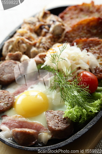 Image of meat with egg