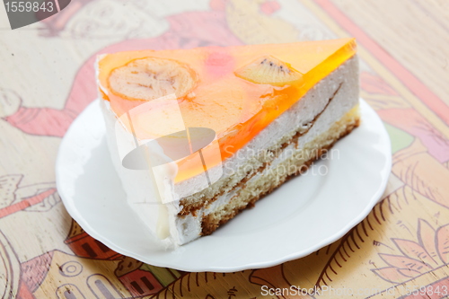Image of Sweet desert on wood background