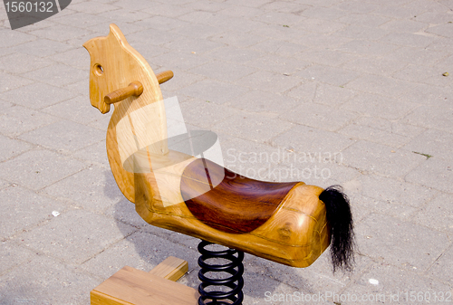 Image of Swing wooden horse toy for kids carved spring tail 