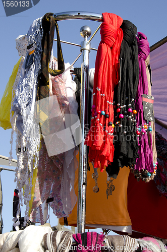 Image of Headscarf cloak and colorful scarves sell market 