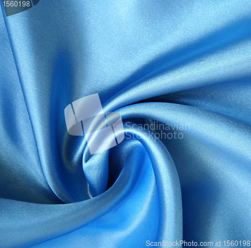 Image of Smooth elegant blue silk as background