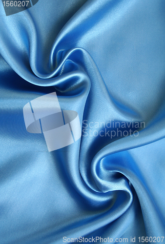 Image of Smooth elegant blue silk as background