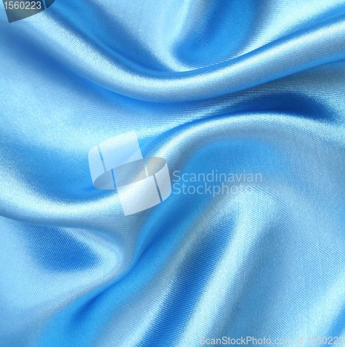 Image of Smooth elegant blue silk as background