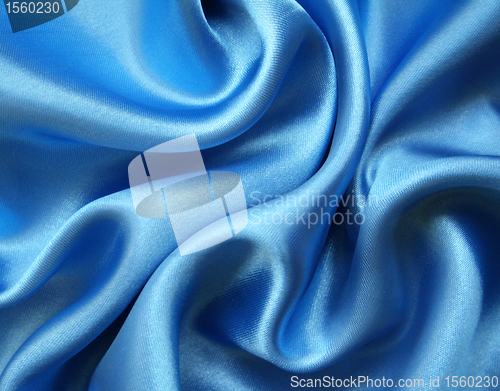 Image of Smooth elegant blue silk as background