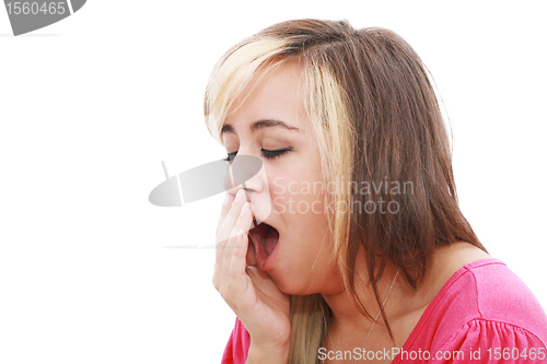 Image of Yawning tired woman, caucasian model isolated on white background.