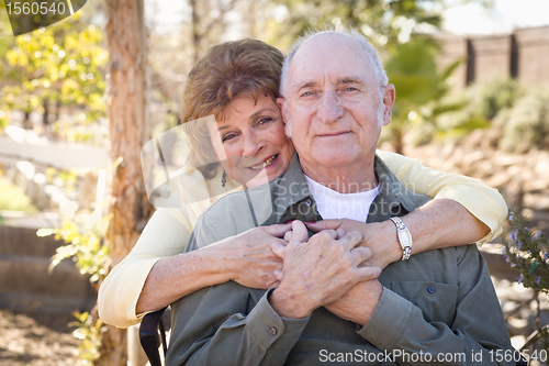 Image of Happy Senior Couple Relaxing in The Park