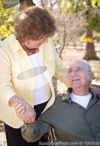 Image of Happy Senior Couple Relaxing in The Park