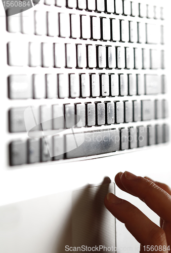 Image of Young woman working on laptop