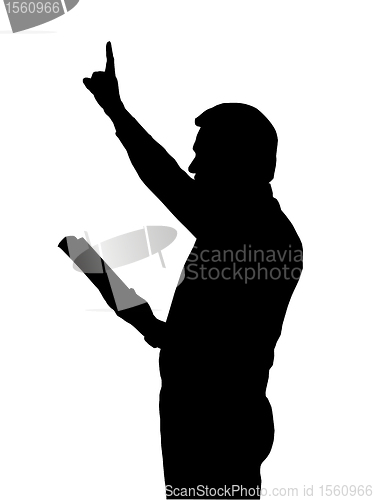 Image of Preacher Teaching from Bible with Raised Arm